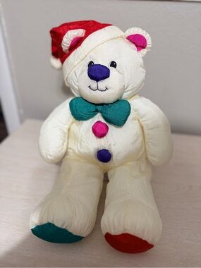 Dakini Cream Plush Bear with Red Hat and Teal Bow